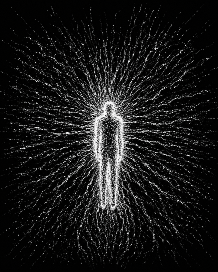 A human figure dissolving into thousands of radiating white particles